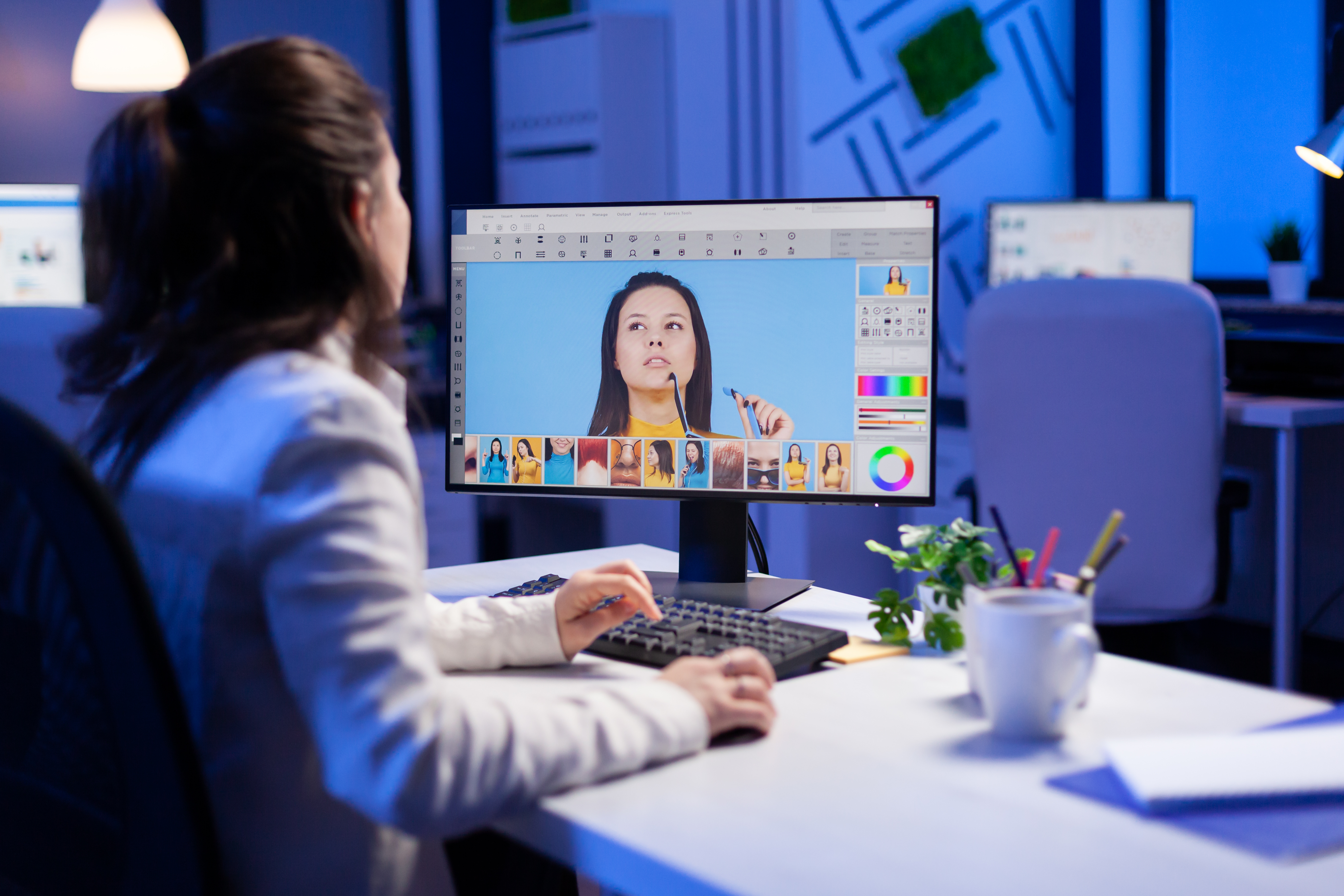 Creative creator doing portrait retouch using color grade